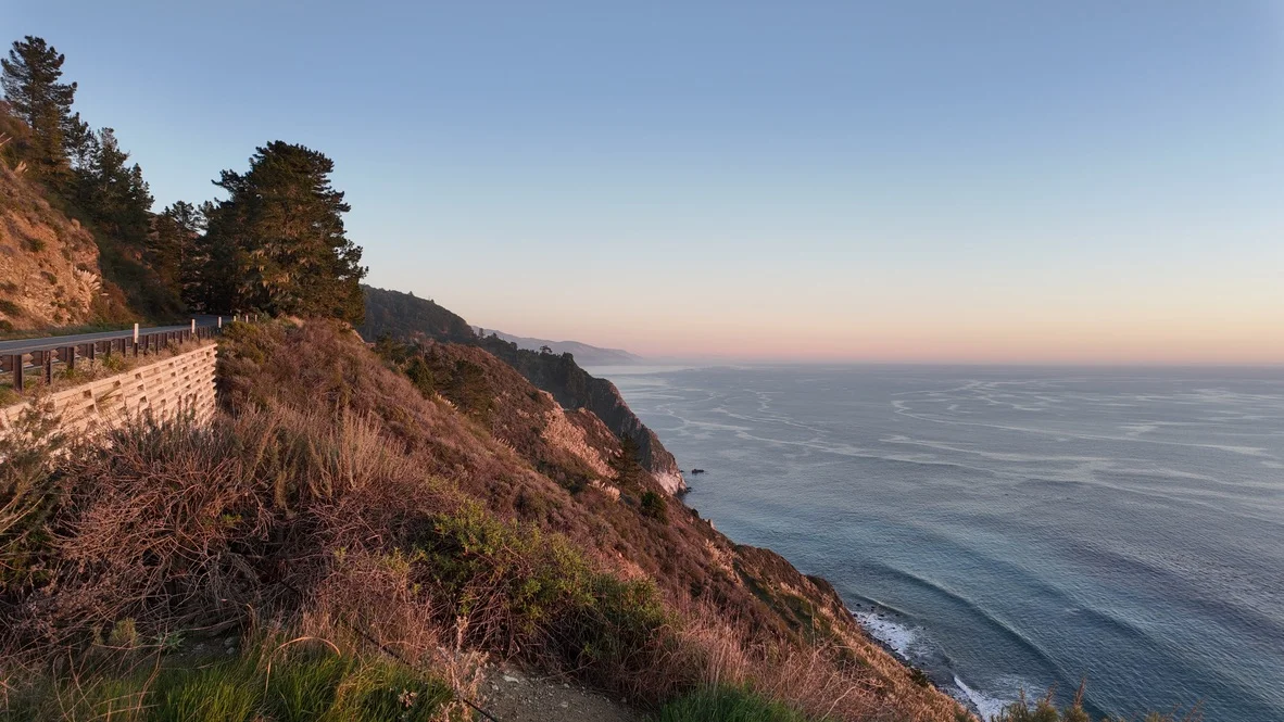 Sun setting over the horizon in Big Sur